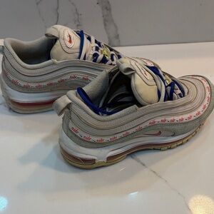 Nike Air Max 97 with Blue and Red Accents
